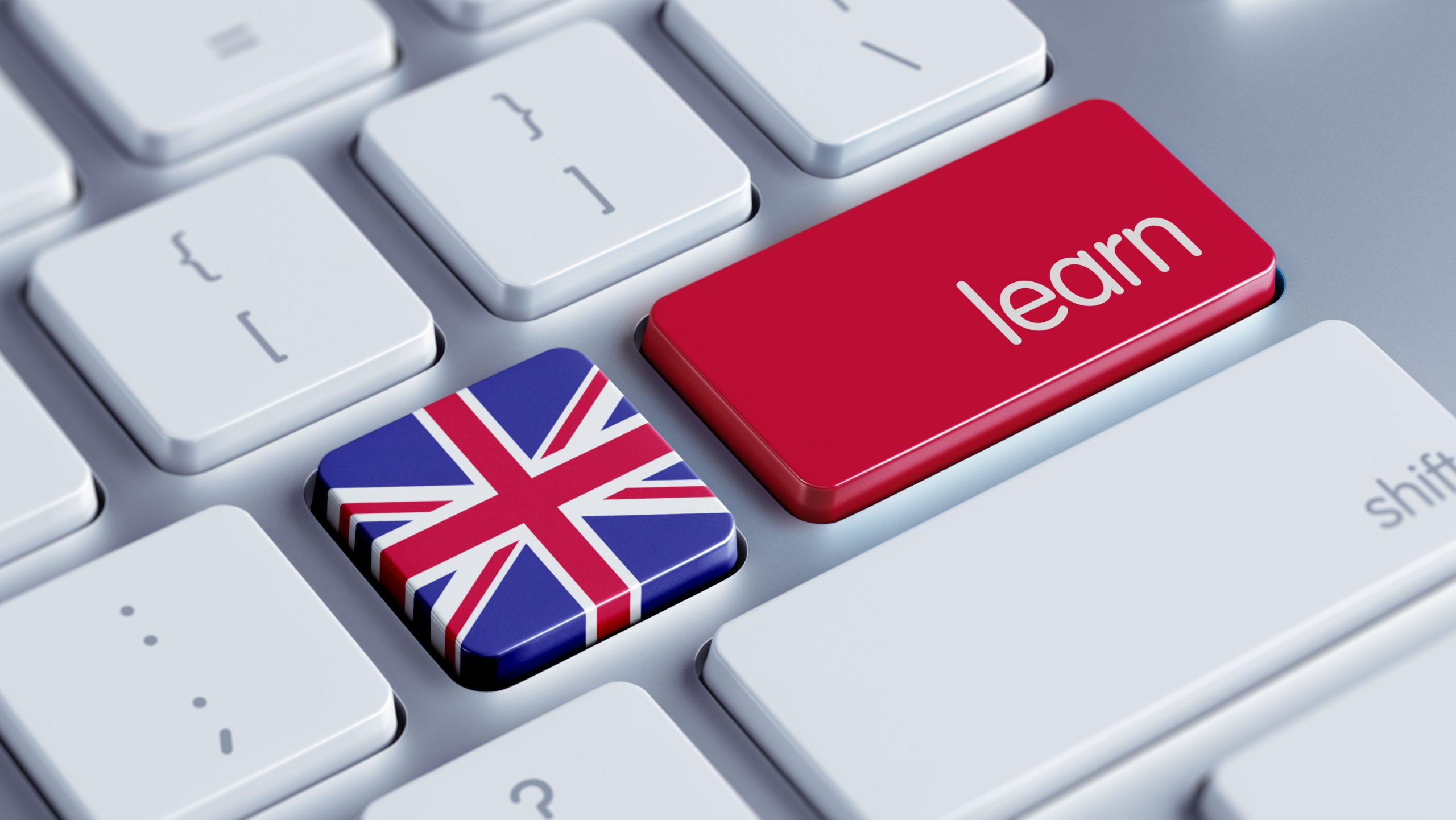 Teclado con botones de bandera Reino unido y botón Learn